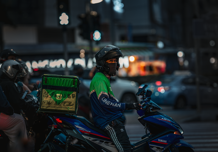 Delivery rider heading out in the evening